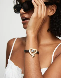 Multi strand leather bracelet with a heart