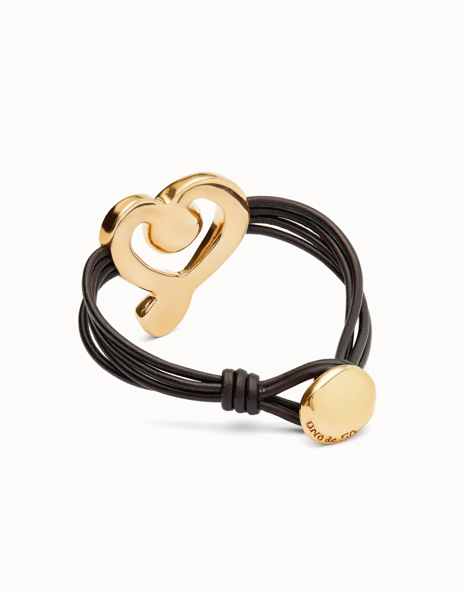 Multi strand leather bracelet with a heart