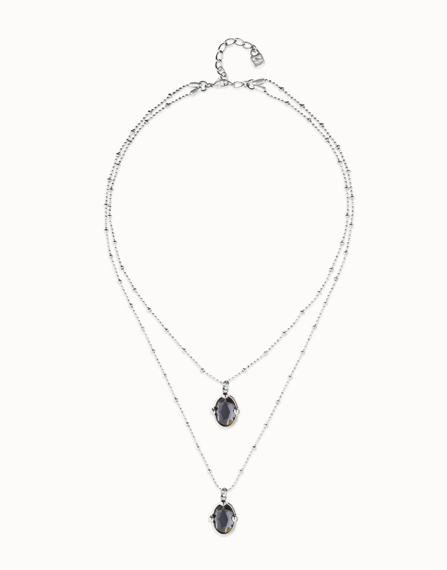 Multi strand necklace with two black oval faceted crystals