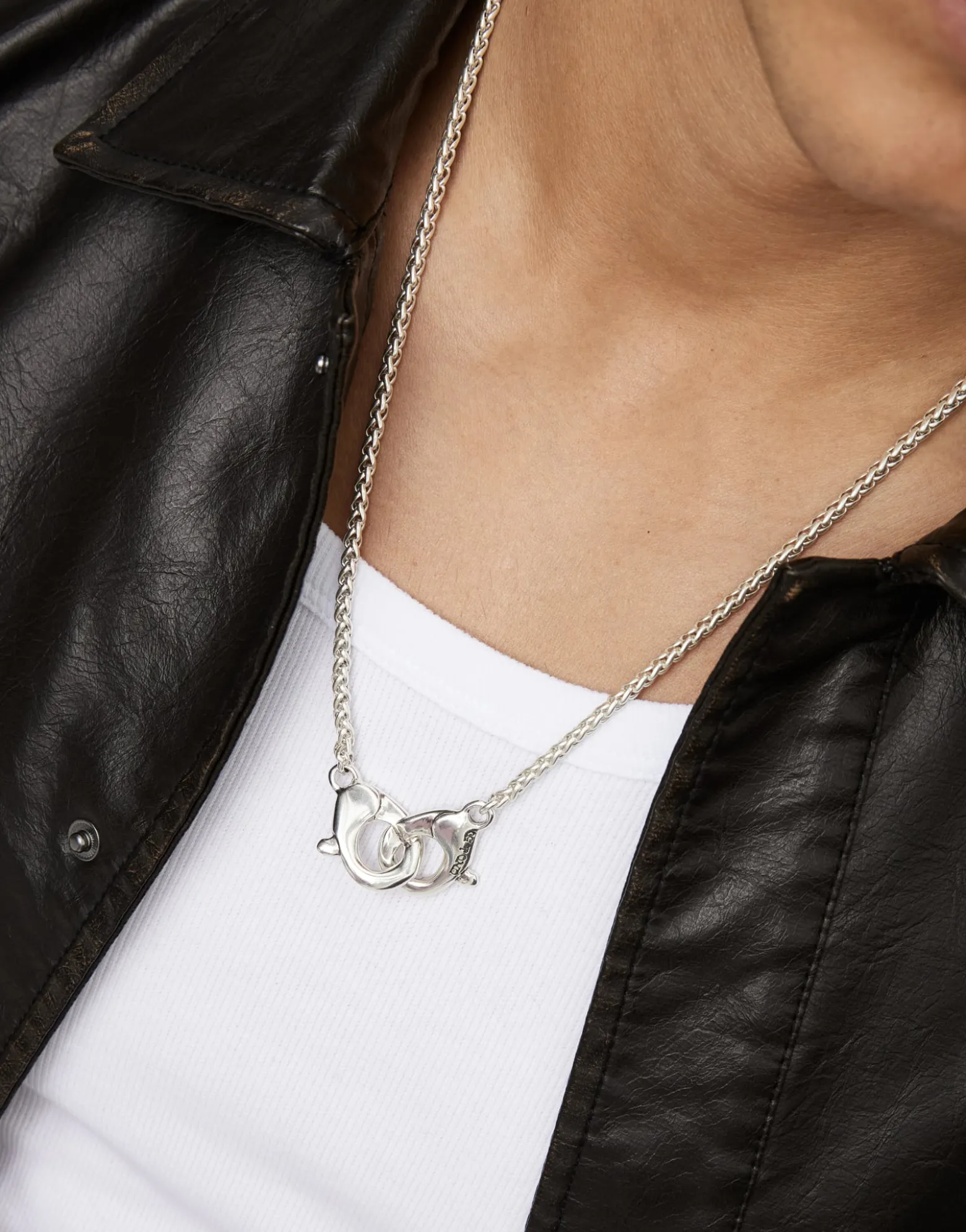 Necklace with intertwined carabiner