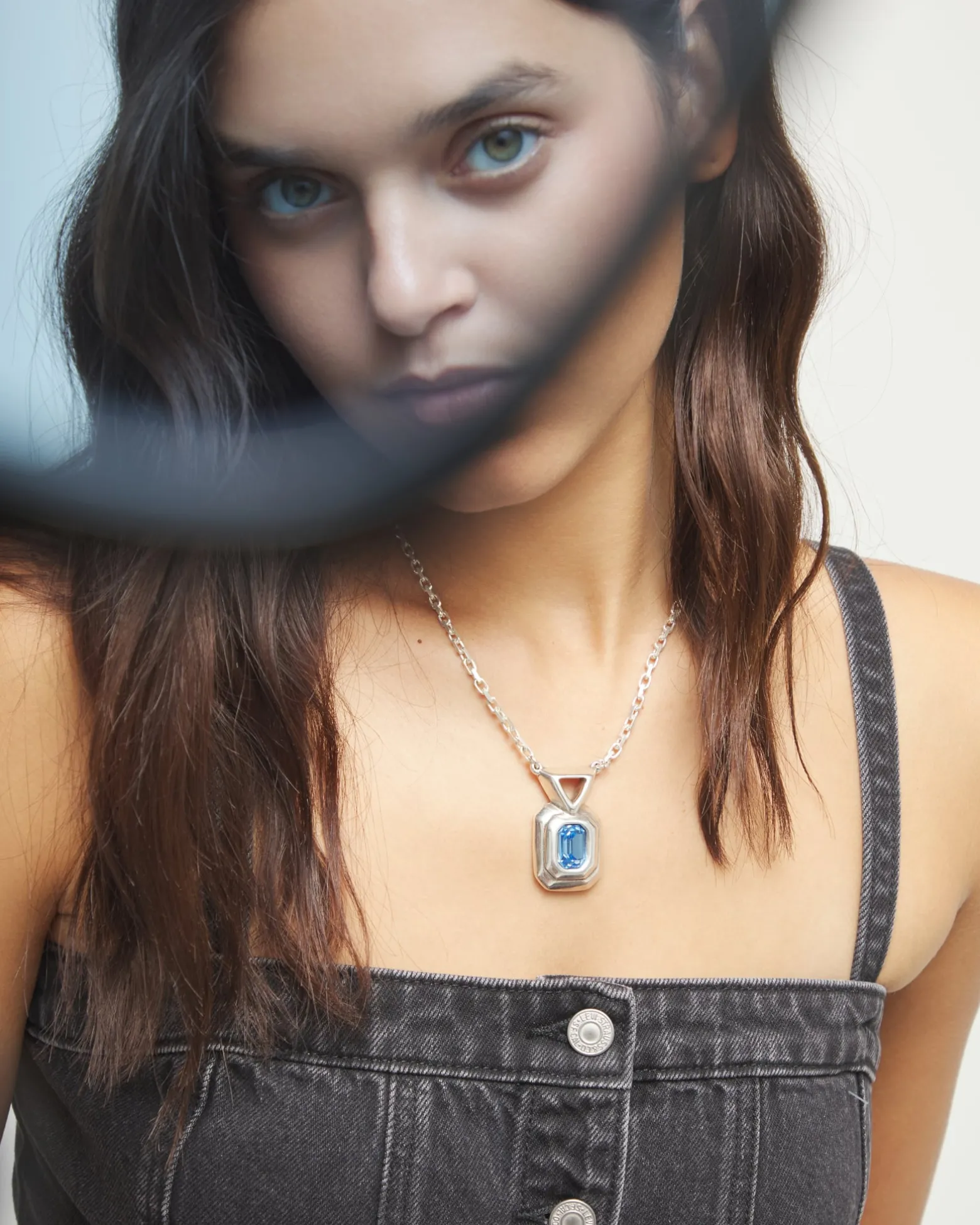 Necklace with rectangular blue faceted crystal