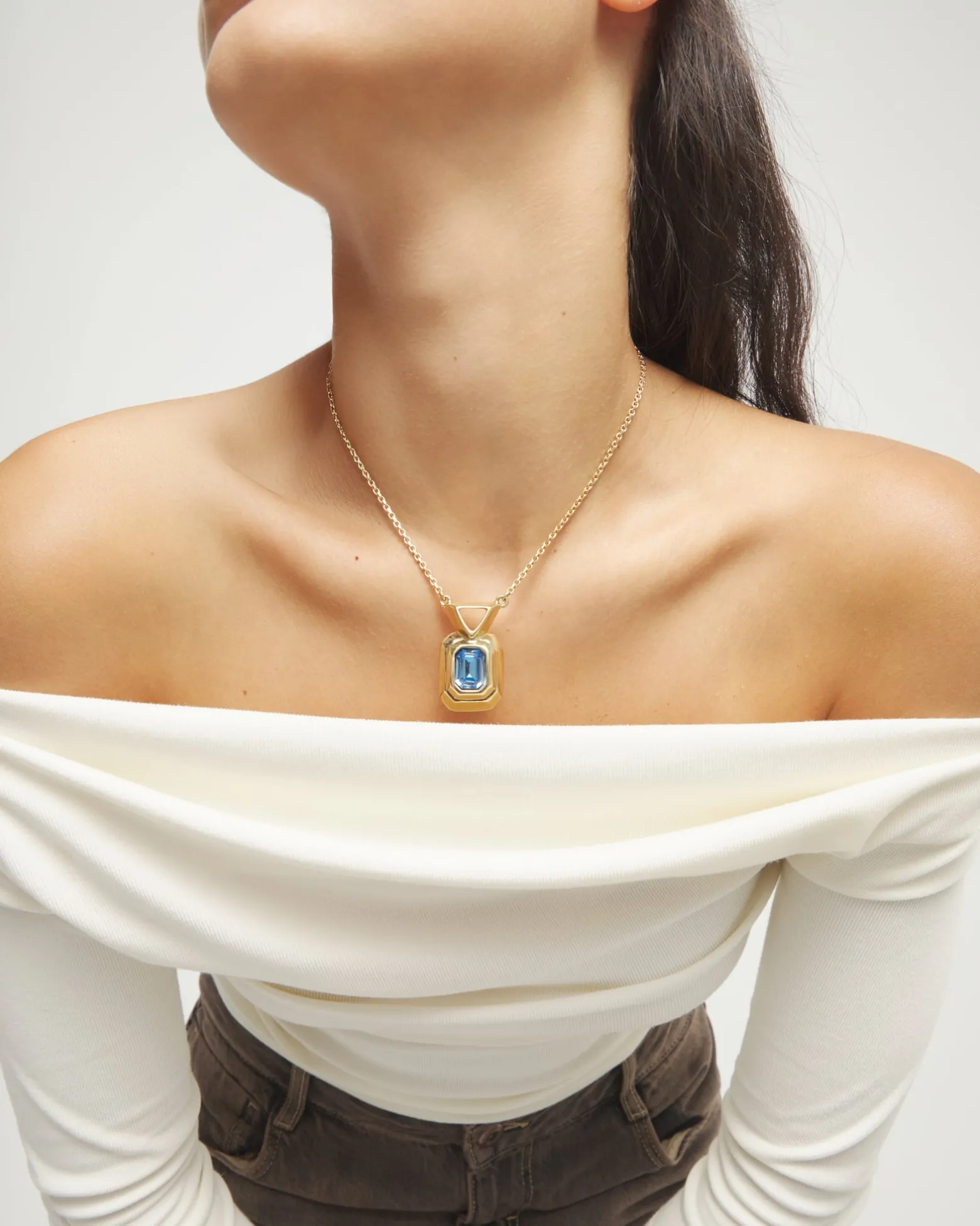 Necklace with rectangular blue faceted crystal