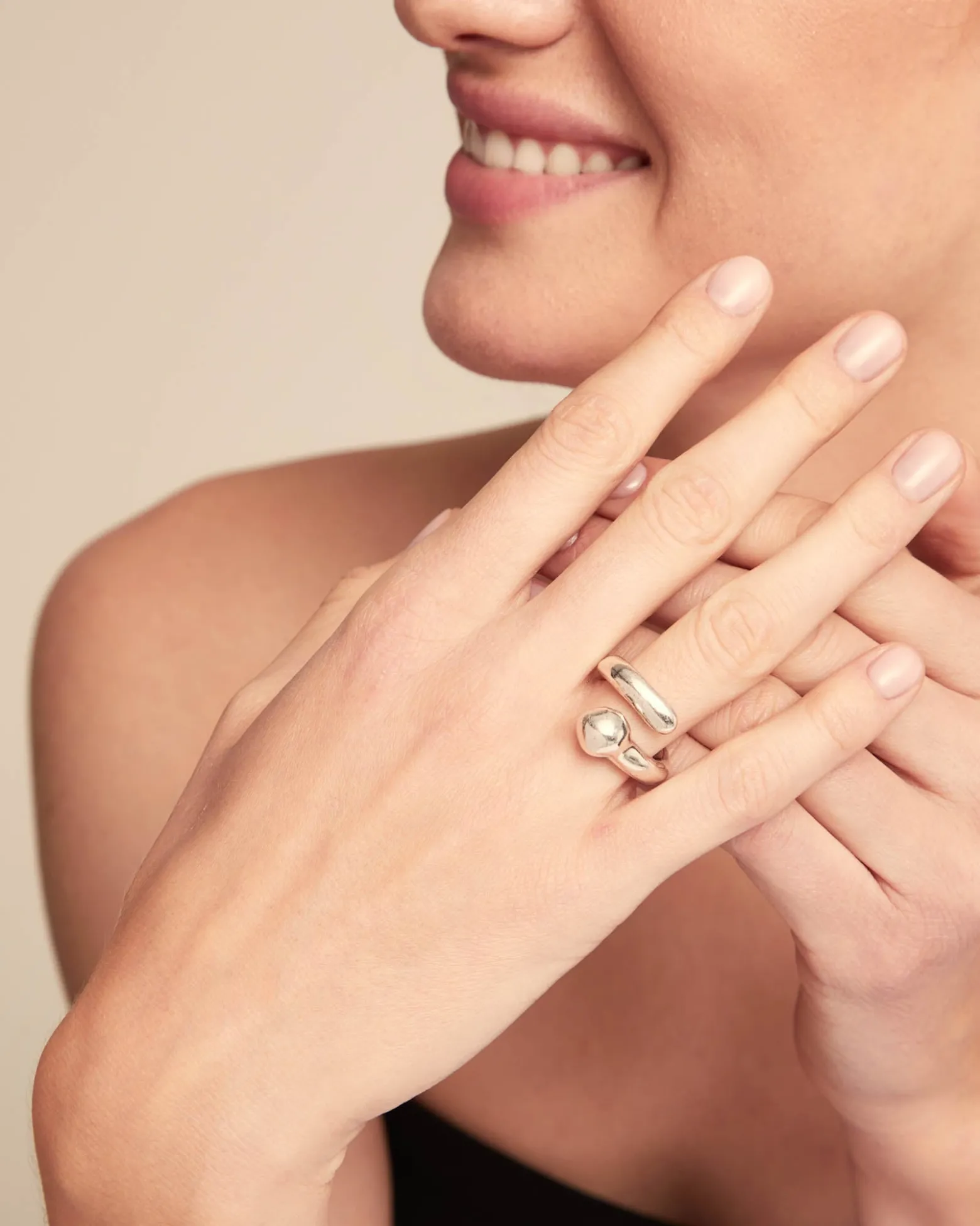 Open organic‑design ring