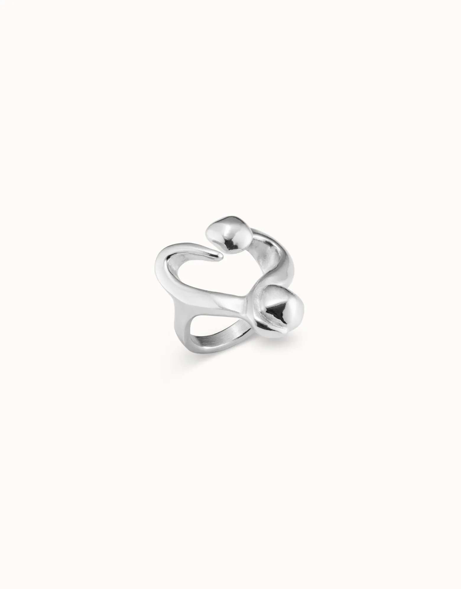 Open ring with a nailed heart