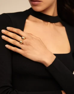Open ring with two beads