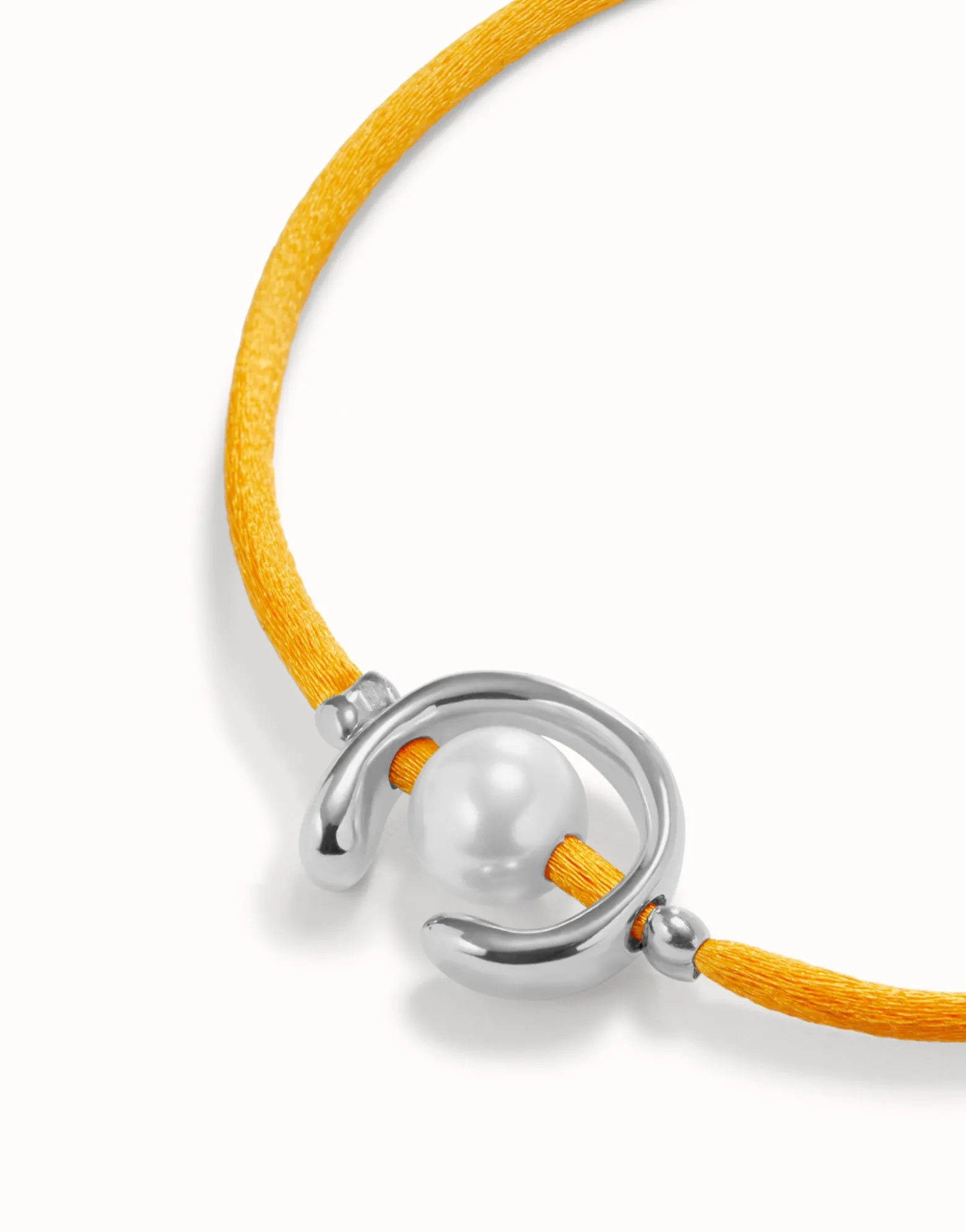 Orange cord bracelet with a pearl