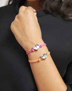 Orange elastic thread bracelet with heart