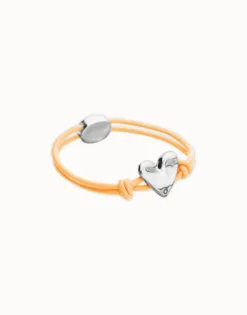 Orange elastic thread bracelet with heart