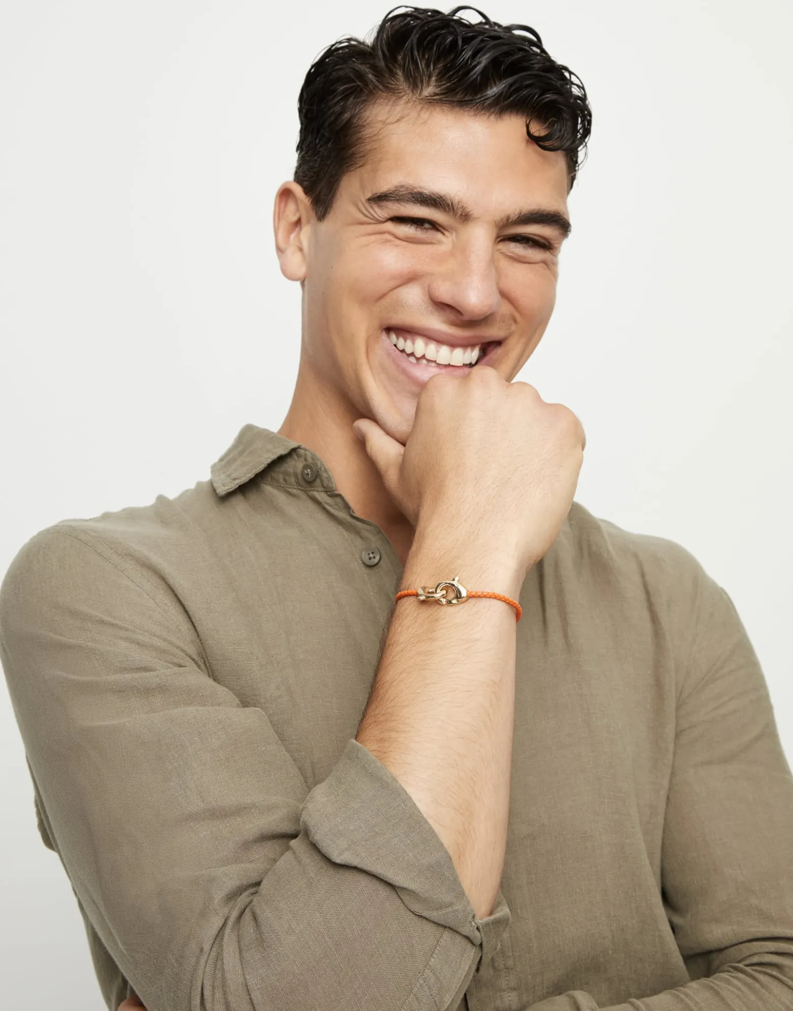Orange leather bracelet with interlocking carabiner