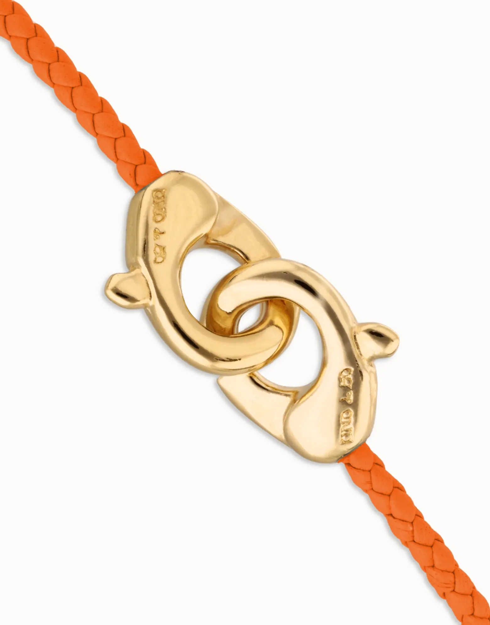 Orange leather bracelet with interlocking carabiner