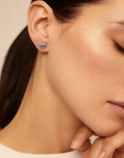 Piercing with blue crystal