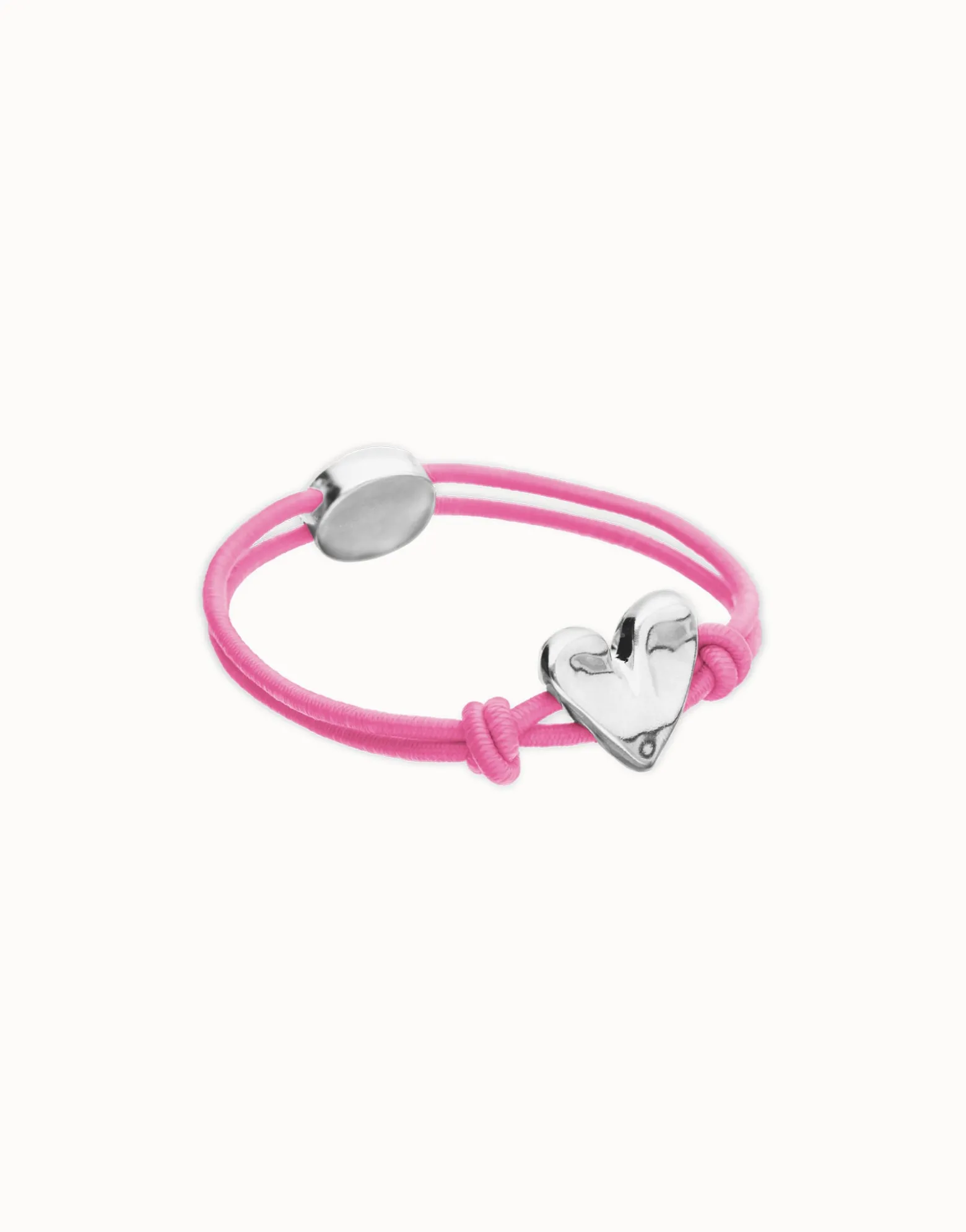 Pink elastic thread bracelet with heart charm