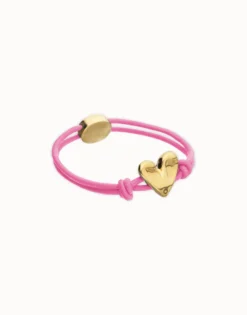Pink elastic thread bracelet with heart charm
