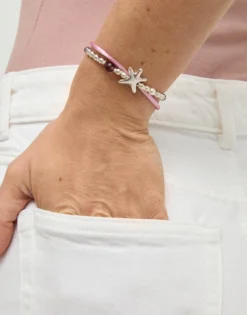 Pink silk thread and metal bracelet with starfish