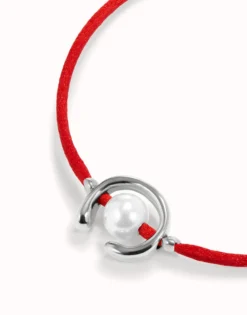 Red cord bracelet with a pearl