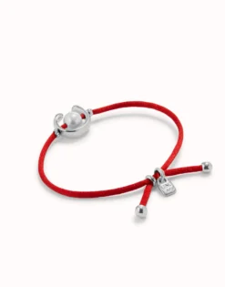 Red cord bracelet with a pearl