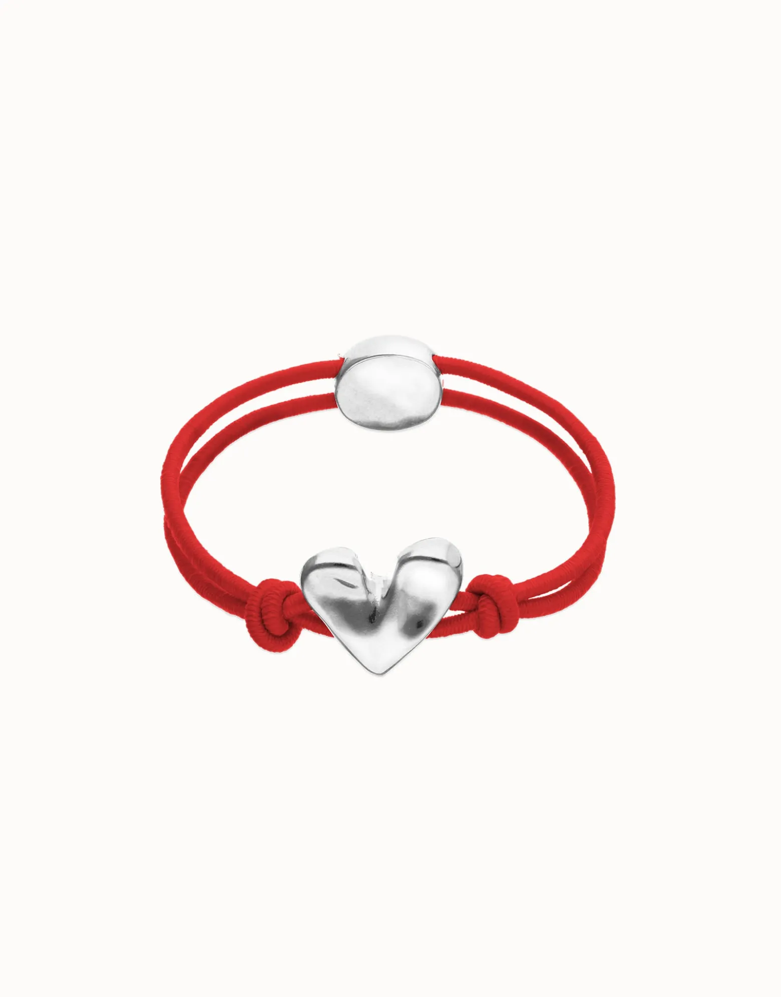 Red elastic thread bracelet with heart