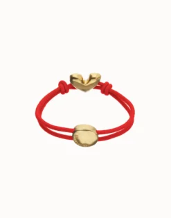 Red elastic thread bracelet with heart