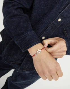 Red leather bracelet with interlocking carabiner