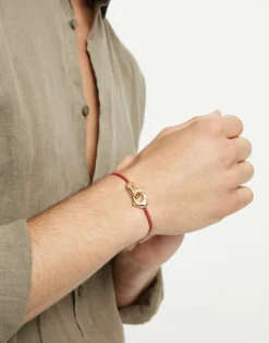 Red leather bracelet with interlocking carabiner