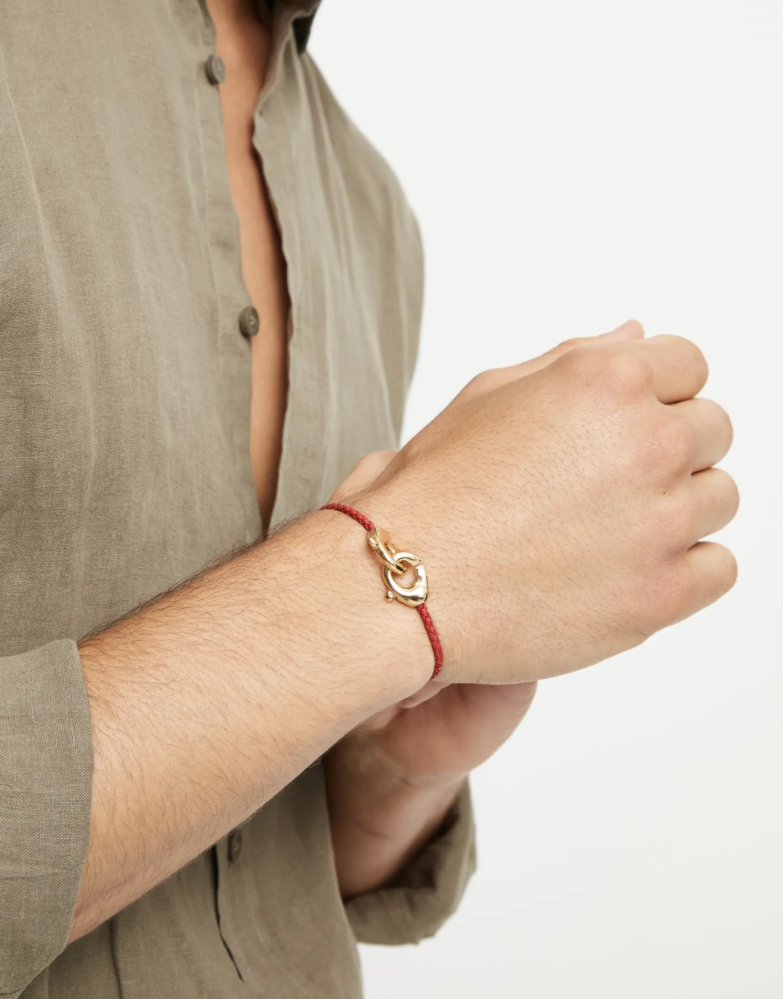 Red leather bracelet with interlocking carabiner