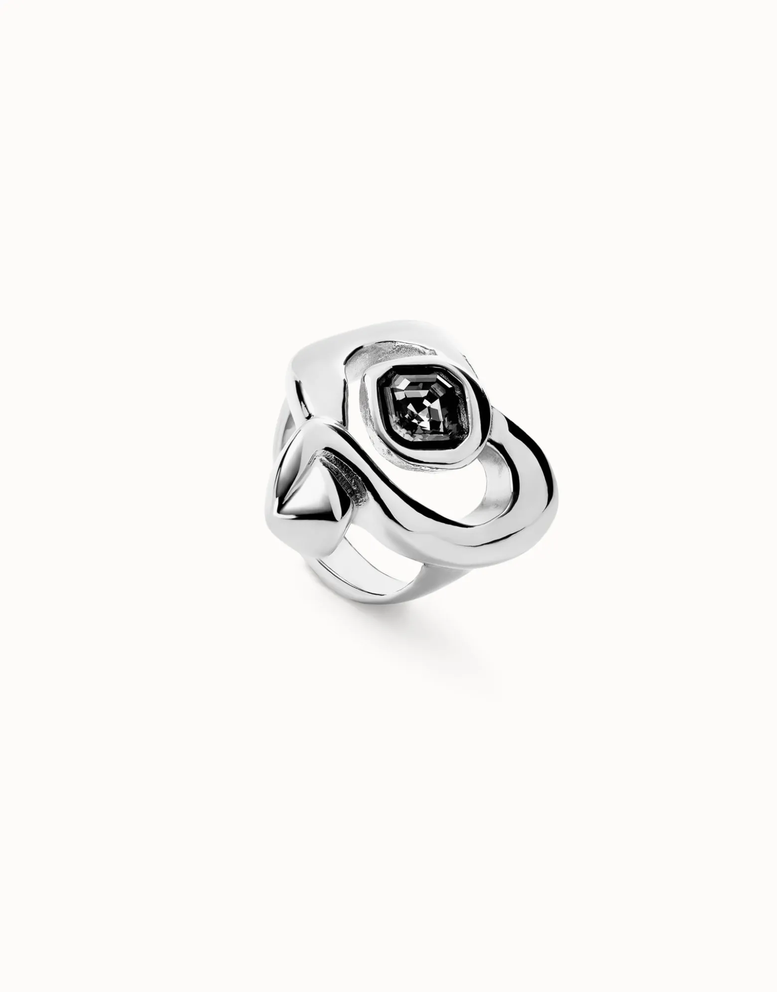 Ring with heart and central black crystal