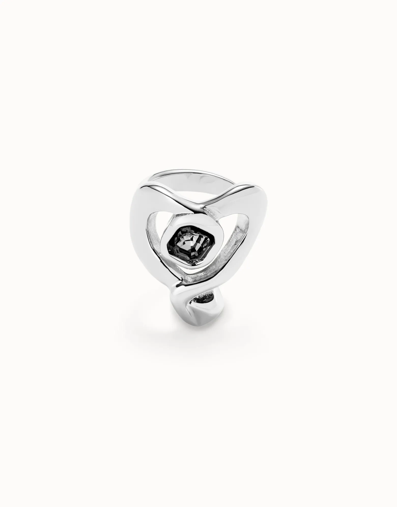 Ring with heart and central black crystal