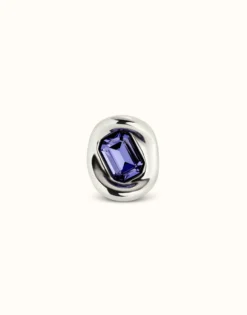 Ring with purple crystal