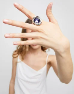 Ring with purple crystal