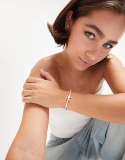 Salmon cord bracelet with a pearl