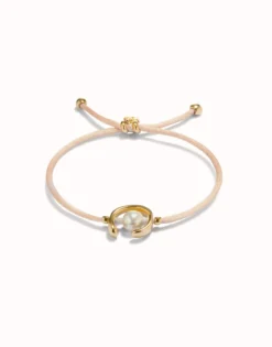 Salmon cord bracelet with a pearl