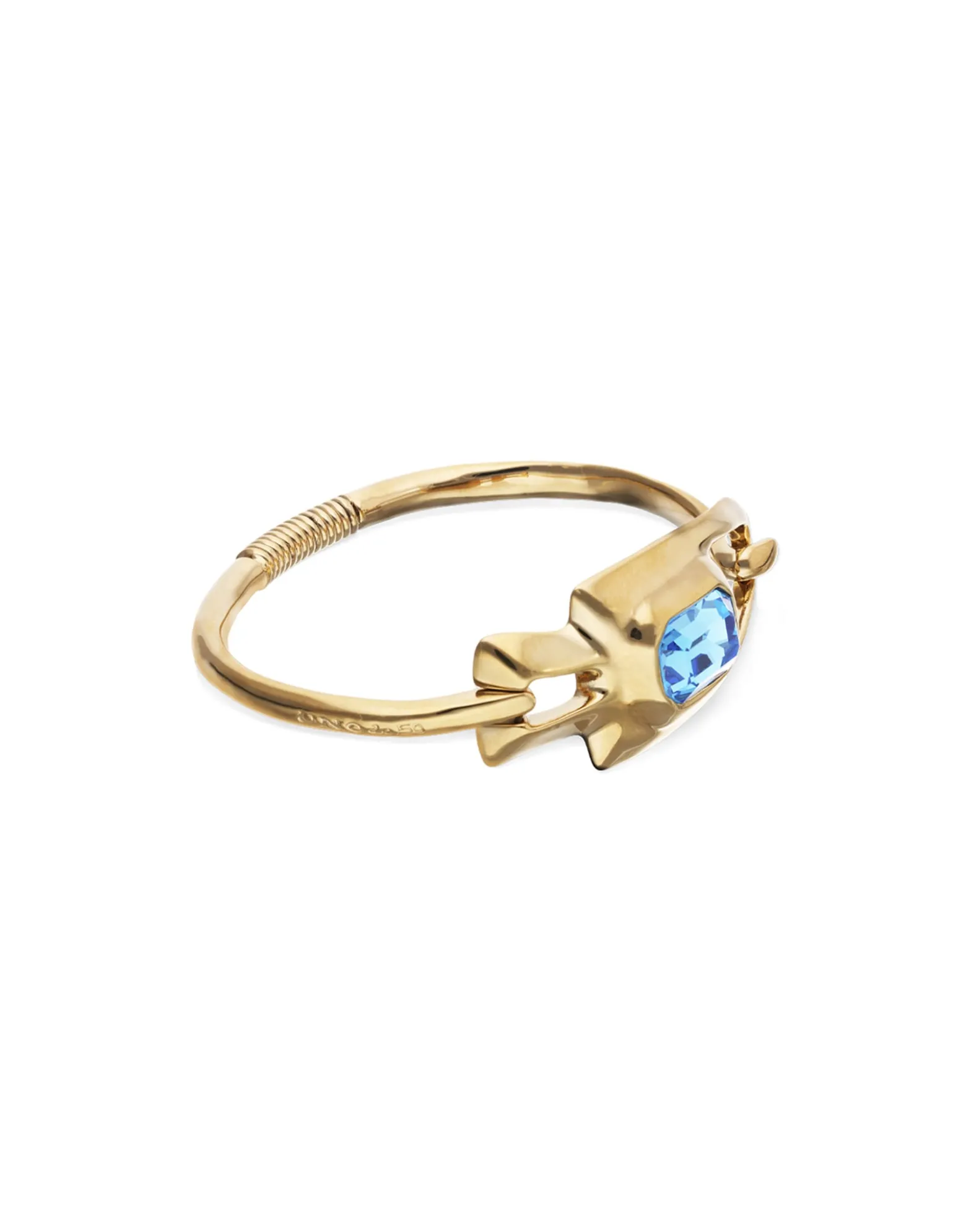 Semi-rigid bracelet with blue faceted crystal