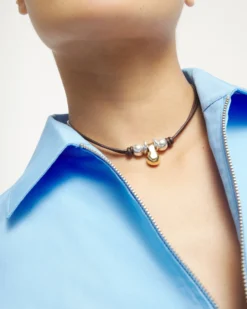Short leather necklace with three spheres