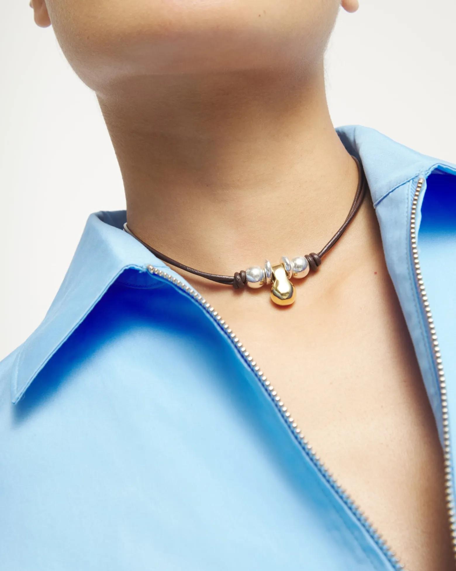 Short leather necklace with three spheres