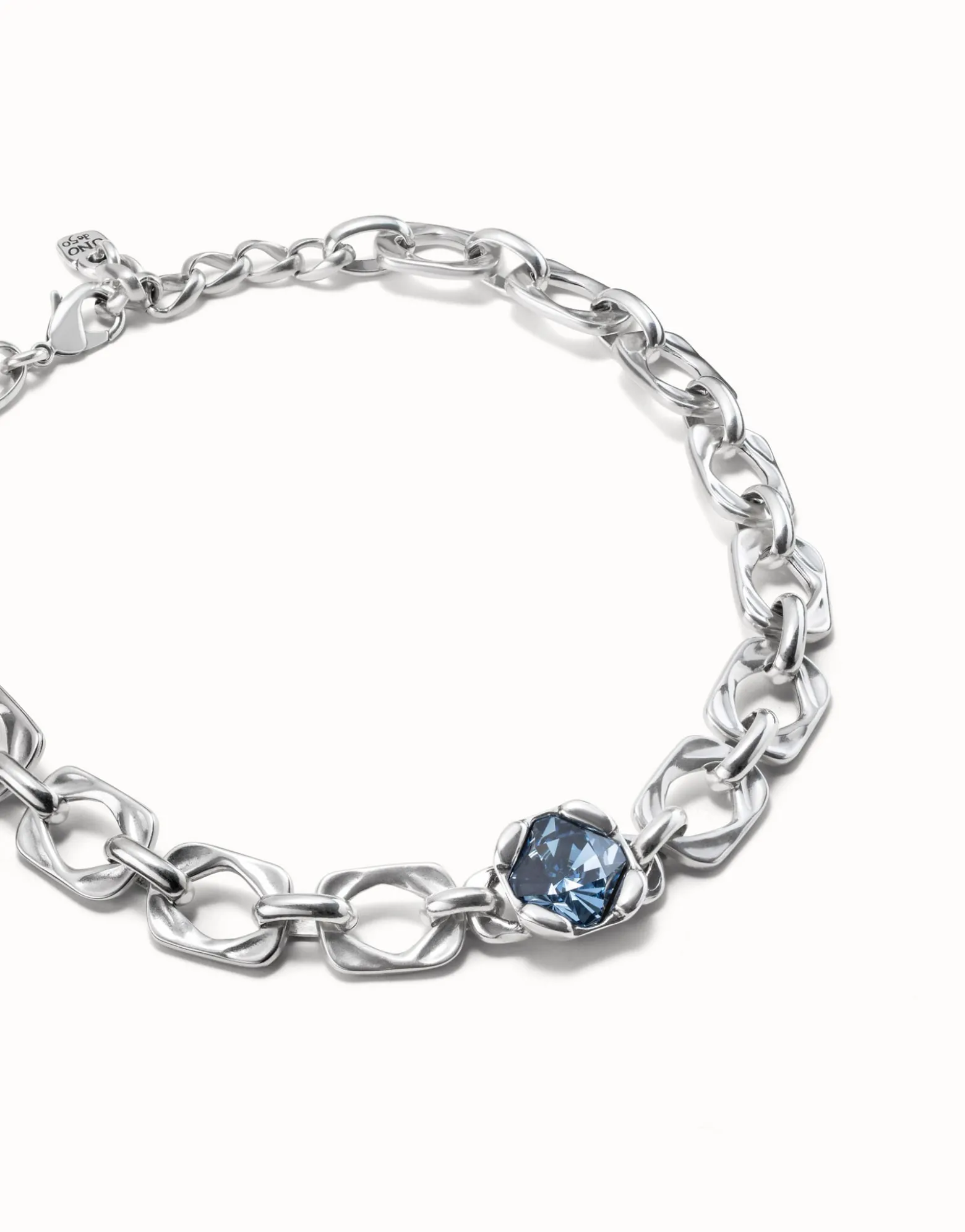 Short link chain necklace with large blue crystal