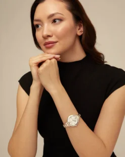 Sterling silver-plated watch with metal strap and round white dial