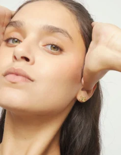 Stud earrings with a butterfly shape