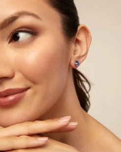 Stud earrings with blue crystal