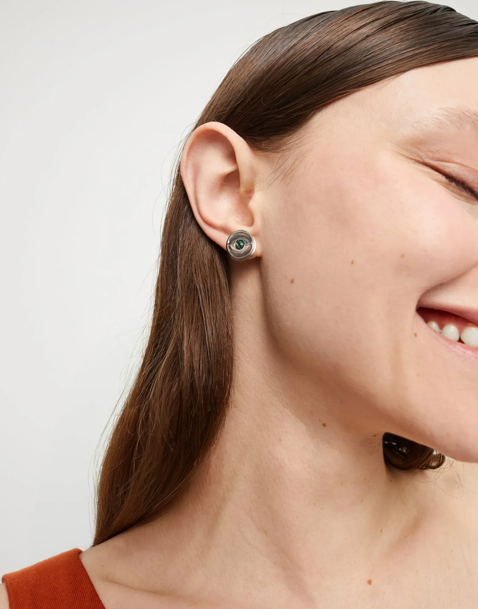 Stud earrings with green faceted crystal