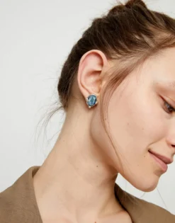 Studs with blue oval faceted crystals