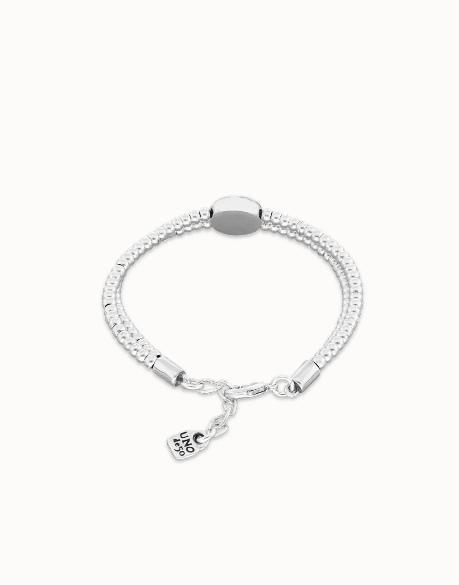 Two-strand beaded bracelet with an eye-shaped charm
