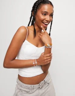 Yellow cord bracelet with a pearl