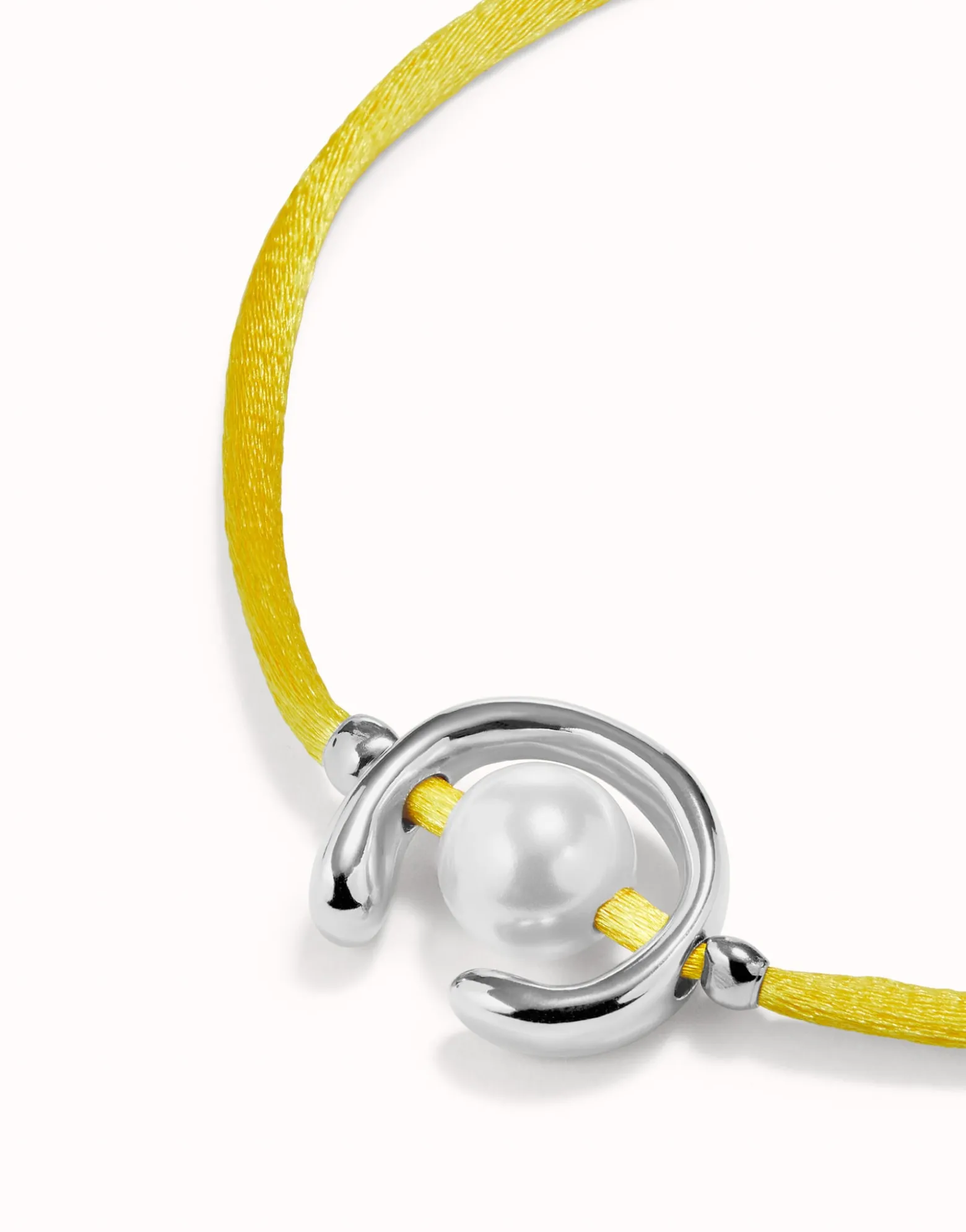 Yellow cord bracelet with a pearl