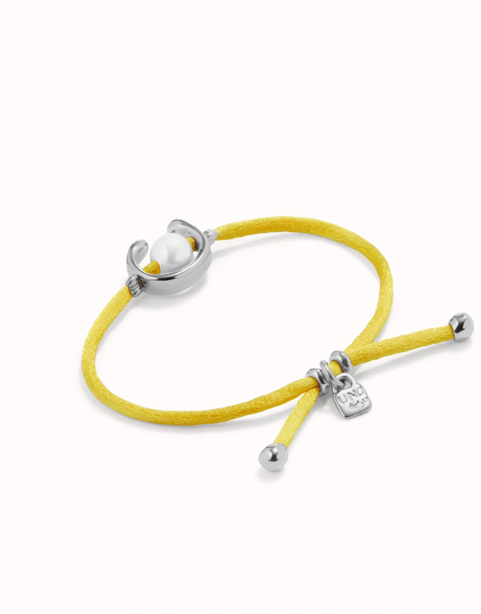 Yellow cord bracelet with a pearl